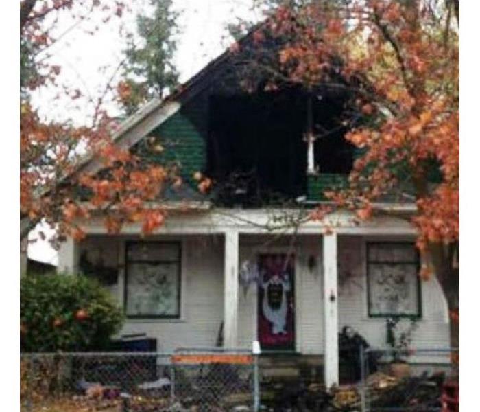 Fire damage to the upper story of a home